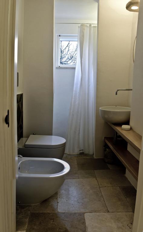 La Vecchia Tabaccheria B&B 오스투니 객실 사진