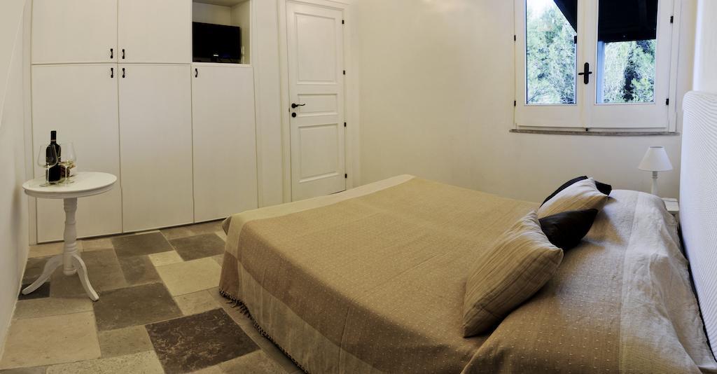 La Vecchia Tabaccheria B&B 오스투니 객실 사진